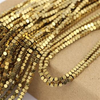 Hematyt kostka fasetowana złota 2mm [sznur 40cm]