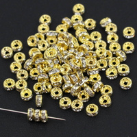 Przekładka oponka z cyrkoniami gold/crystal 4mm [10szt]