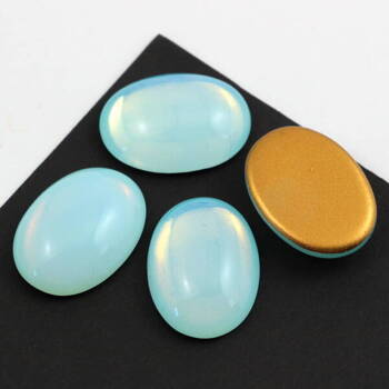 Kaboszon szklany Milky Aquamarine - Gold Matte Foiled owal 25x18mm