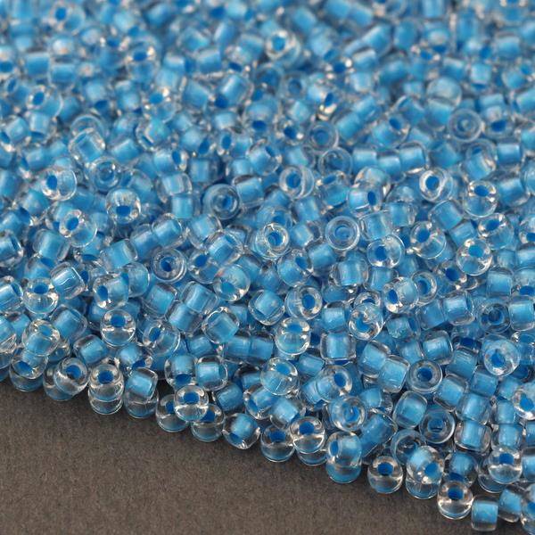 Matubo 8/0 Crystal Blue Neon Lined [10g]