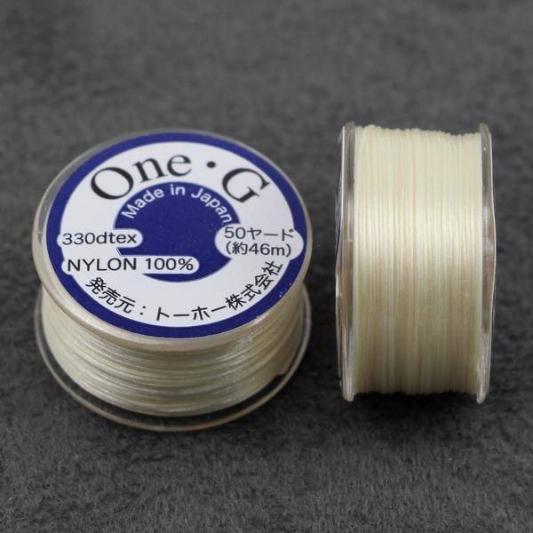 One-G nici nylonowe cream 0,25mm [szpula 46m]