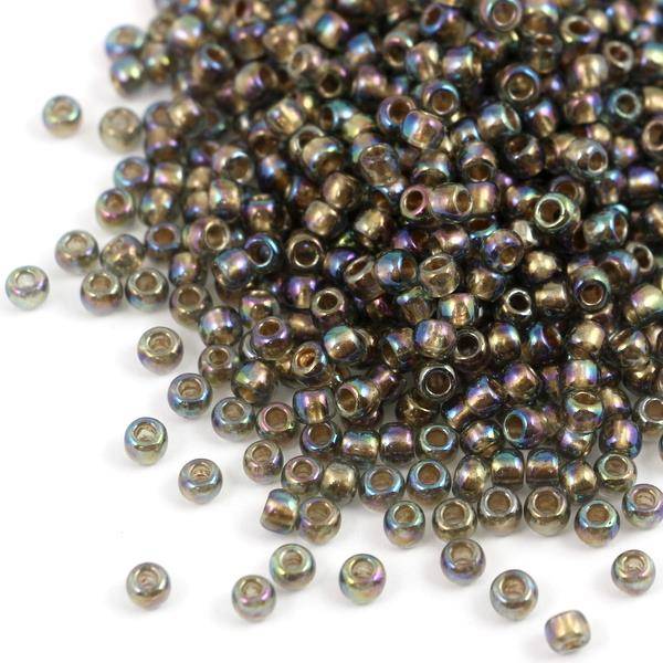 Toho Round 6/0 Gold-Lined Rainbow Black Diamond [10g]